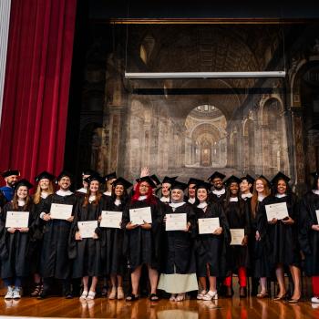 Cohort 9 Group Photo on Stage