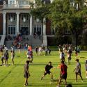 Students playing a group activity in court yard.